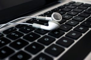 Ear Buds on a laptop keyboard